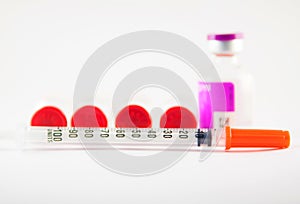 Disposable syringe and injection vials