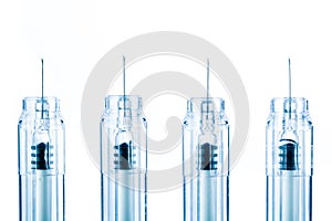 Disposable syringes on white