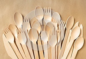 Disposable Wooden Cutlery Set on a paper background.