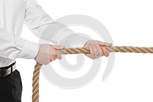 Dispute concept. Man pulling rope on white background, closeup