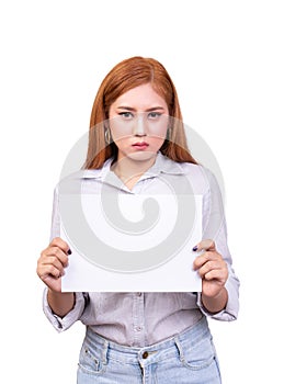 Dissatisfied Asian woman holding blank white paper banner for protested with frown face. studio portrait shot isolated on white