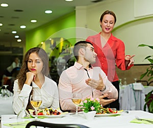 Dissatisfied visitors in restaurant