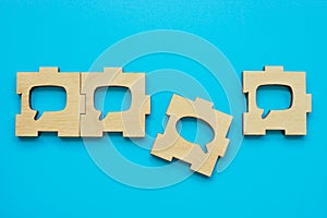 Dissenting or opposing opinion. Pieces of the puzzle with speech bubble.