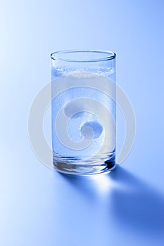 Dissolving Antacid Tablets In Glass photo