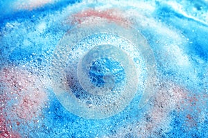 Dissolving color bath bomb in wate