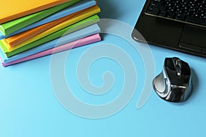 Distance Learning Concept. Stack of books, laptop. Online training