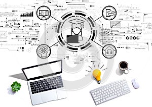 Distance learning theme with computers with a light bulb