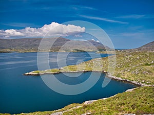 In the distance, the remote community of Tarbert on the Isle Harris in the Outer Hebrides, Scotland, UK.