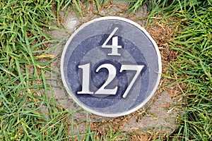 Distance yardage marker on golf course