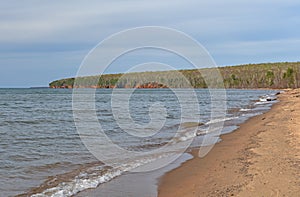 Distant Cliffs on a Quiet Beach