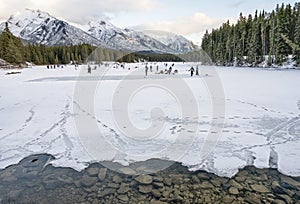 Distant Ice Skaters on Frozen Johnson Lake