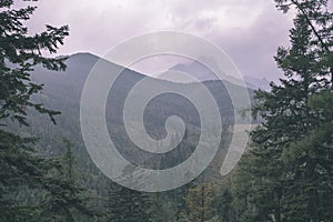 Distant mountain cores in slovakia Tatra mountain trails - vintage retro film look