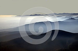 Distant mountain silhouette with clear sky and soft light