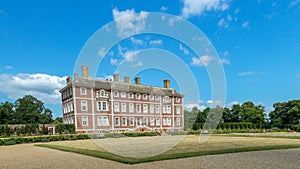 Distant perspective view of Ham House on a summer`s day