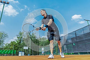 Distant Plan of Man Tennis Player Prepares to Serve a Tennis Ball At Match.