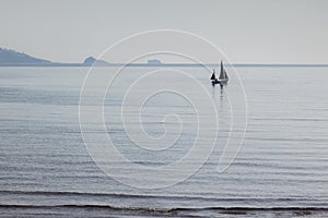 Distant Sailing Boat Torbay UK