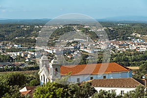 Distant view across the expanse of Santarem region with the Church of Ourem in the foreground, Portugal photo