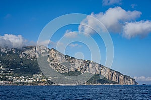 Distant view of Anacapri and Phoenican Steps, La Scala Fenicia, stone stairway along the island mountain