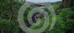 Distant View of Beautiful Waterfall in Indian Forest.