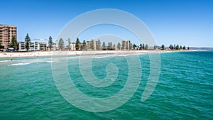 Distant view of Glenelg beach in Adelaide suburb on hot sunny summer day in SA Australia