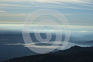 Distant view of the Madrid skyline in the mist, taken from the Guadarrama range