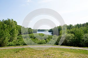 Distant view on a sea surrounded by trees in geeste emsland germany