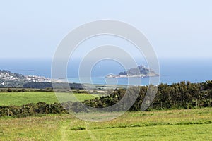 Distant view of St. Michaels Mount at high tide. Marazion, Cornwall, UK