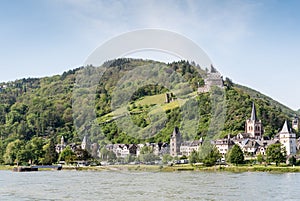 Distant view of the town of Bacharach from the river Rhine, with Stahleck Castle prominently visible above
