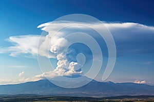 distant view of a volcano releasing smoke plume