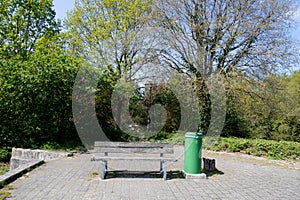 Distant view on a wooden bench with trees in geeste emsland germany