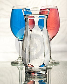 Distortion and refraction in three glasses of water