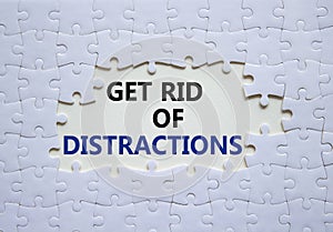 Distractions symbol. Concept word Get rid of Distractions on white puzzle. Beautiful white background. Business and Get rid of