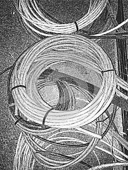 Distress vector texture hank of cable. Black and white grunge background