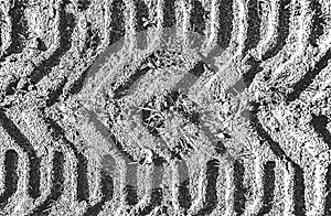 Distressed overlay texture of tire tracks. grunge background