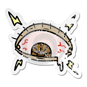 distressed sticker cartoon doodle of an enraged eye