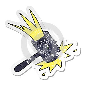 distressed sticker of a cartoon hammer banging