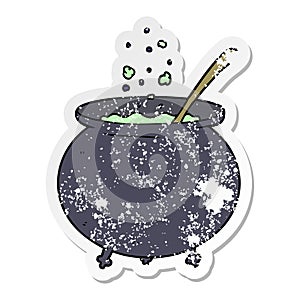 distressed sticker of a cartoon witch cauldron