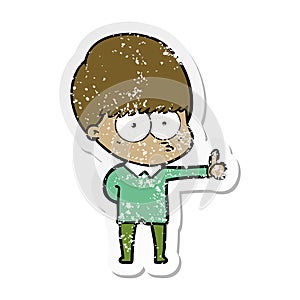 distressed sticker of a curious cartoon boy giving thumbs up sign