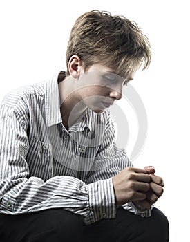 Distressed teenager isolated on white