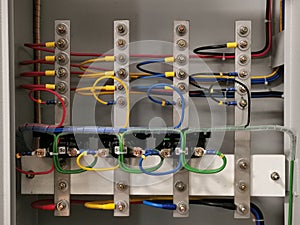 Distribution copper bars connection in electrical cabinet.