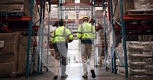 Distribution, logistics and supply chain with factory team walking together to check stock or storage. Delivery, product