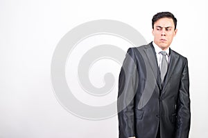 Distrustful man in suit
