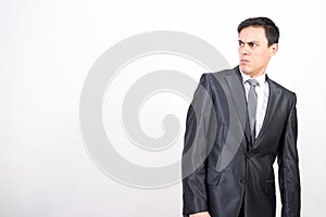 Distrustful man in suit