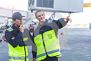 Distrusting and outgoing mechanics working at airport