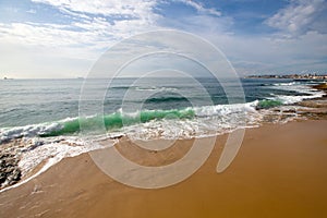 Disturbed ocean on the waterfront. Estoril. Portugal