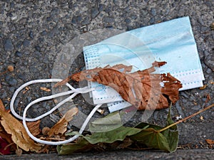 Disused Blue Face Mask in the Gutter