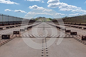 A disused rail bridge seen from where once the rails were photo