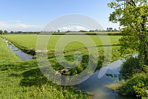 Ditches and fields of Adda park near Abbadia Cerreto