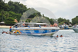 Dive boat leaving Ao Tonsai, on Koh Phi Phi Don. boat diving Koh Phi Phi