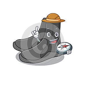 Dive booties mascot design style of explorer using a compass during the journey